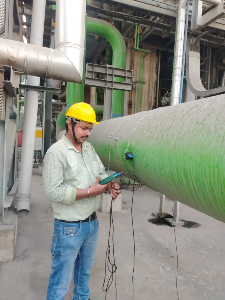 engineer-installing-ultrasonic-flow-meter